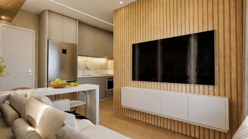 Living e cozinha com bancada integrada